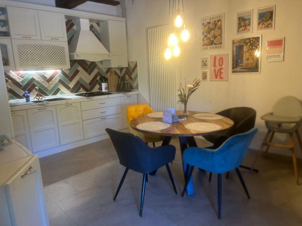 Fully equipped kitchen at Casa Isabella with dishwasher, washing machine, modern appliances and plenty of workspace for self-catering holidays.