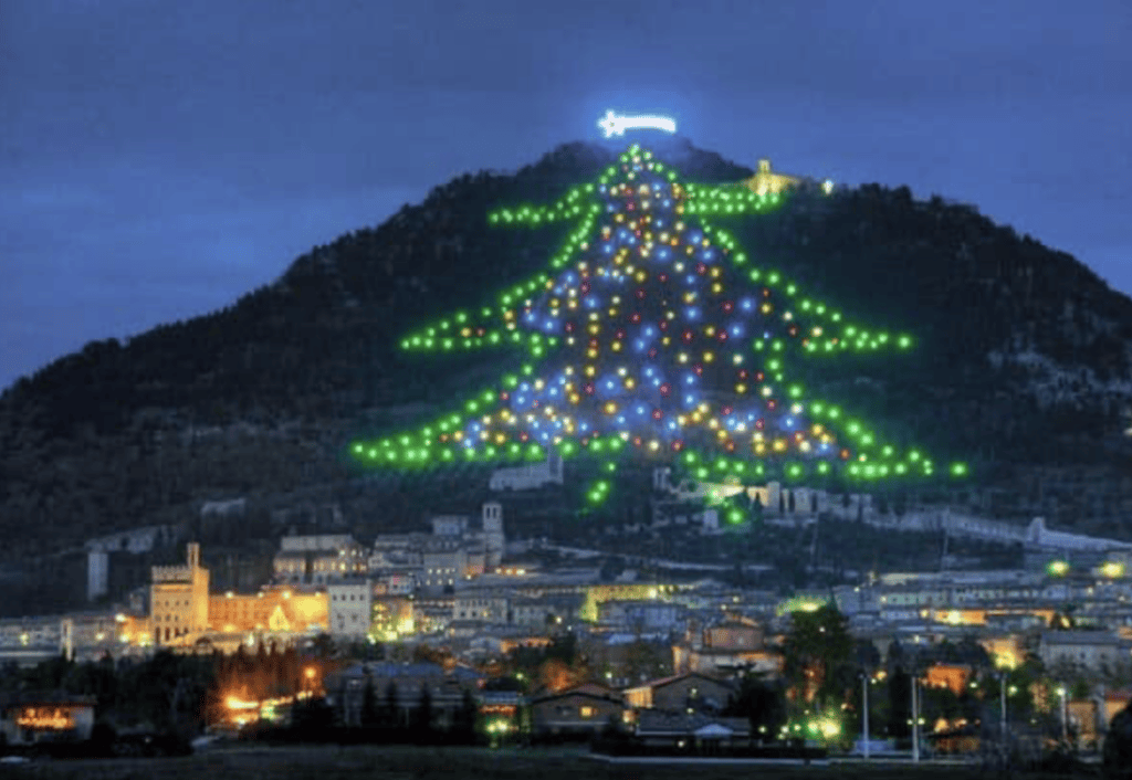 The world’s largest Christmas tree illuminated on Mount Ingino overlooking Gubbio, Umbria, Italy.